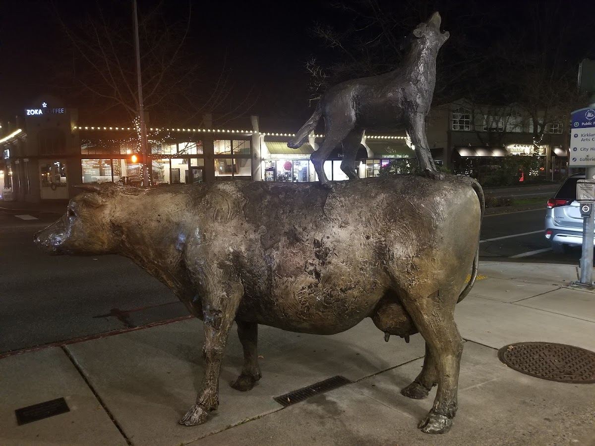 Cow And Coyote Statue