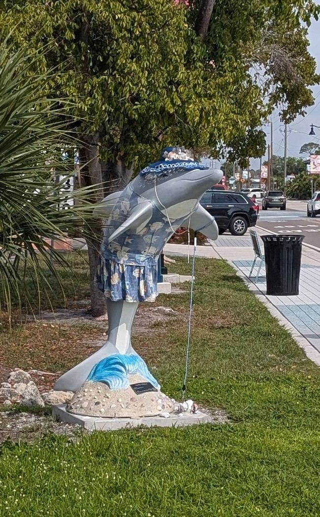 Dressed up Dolphin statue